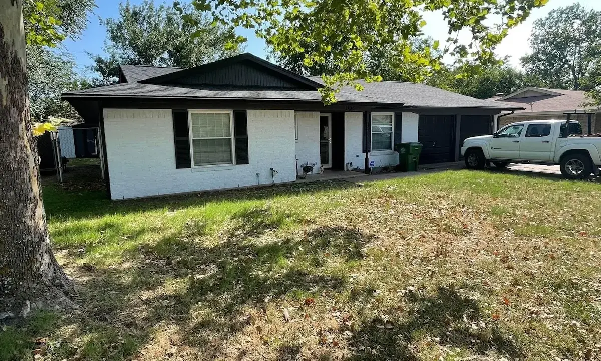 Professional roofing crew working on a residential roof in Ridley Park